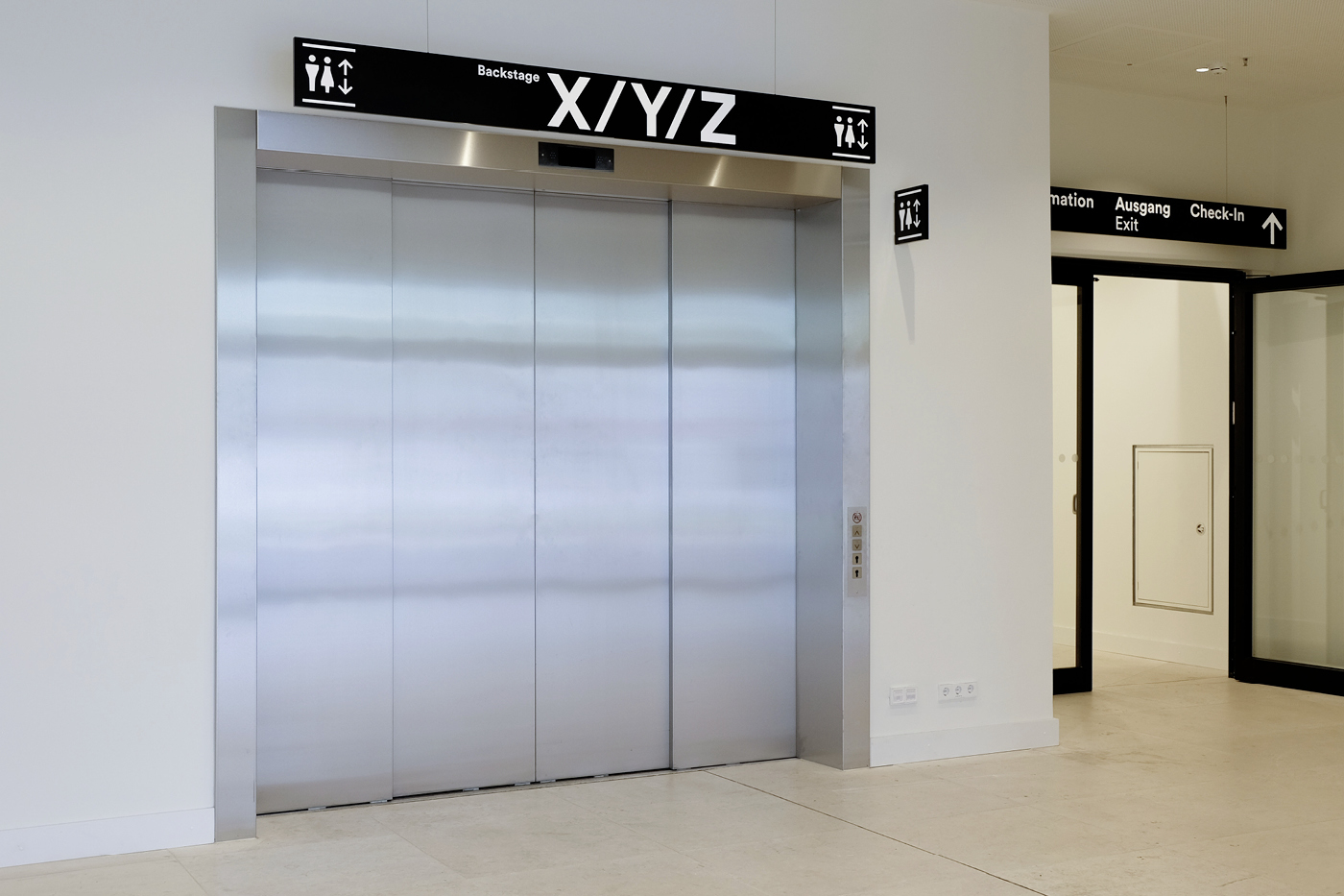 Wegweiser Aufzug (leuchtend)