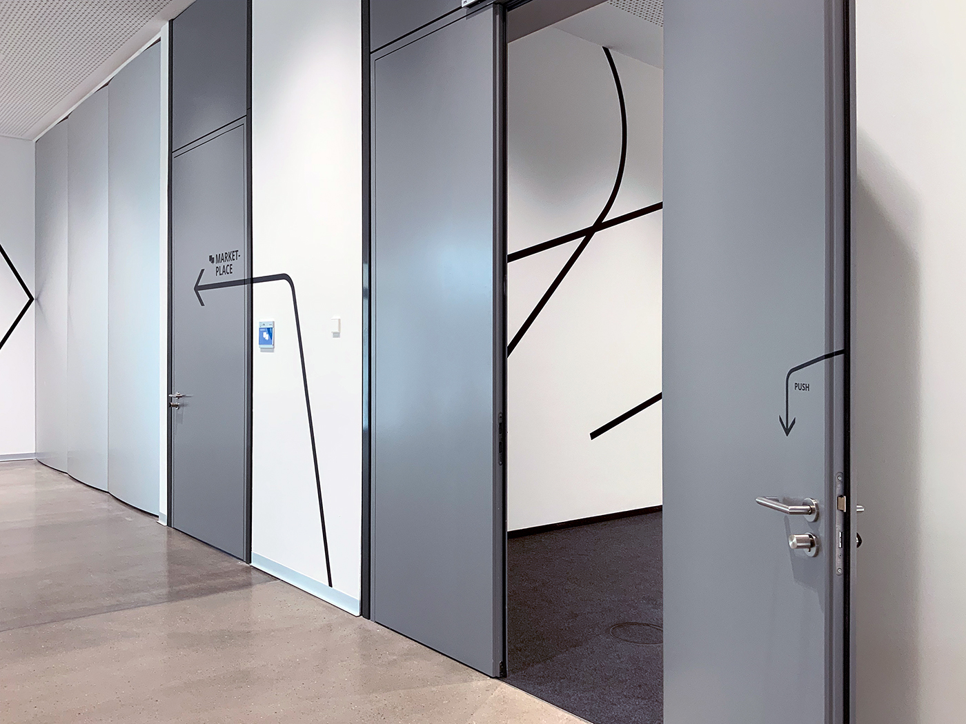 Wall graphics and directional sign