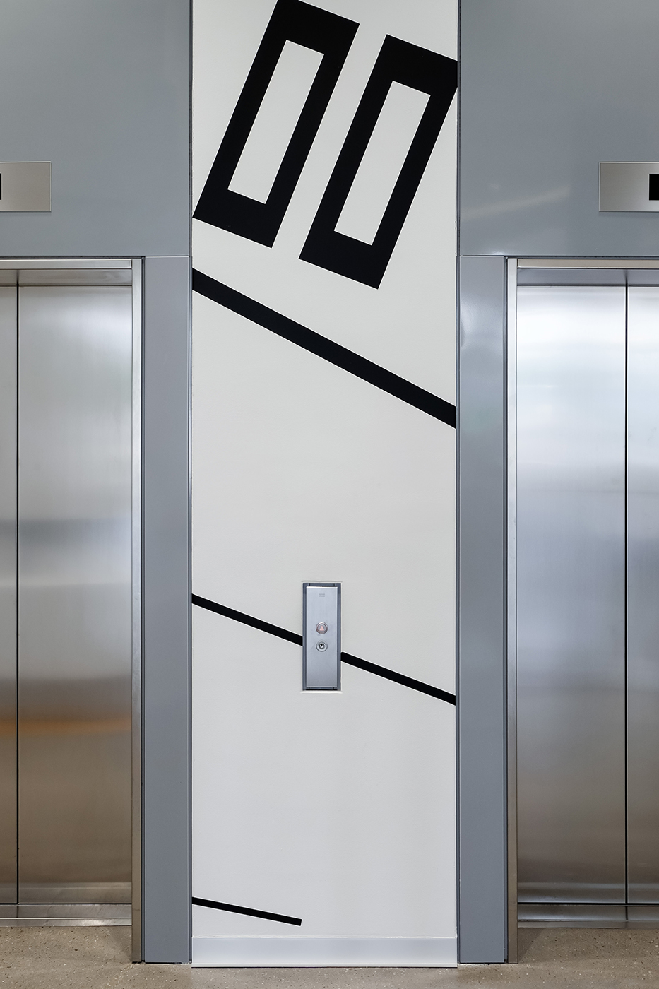 Elevator lobby wall graphics and level identification sign